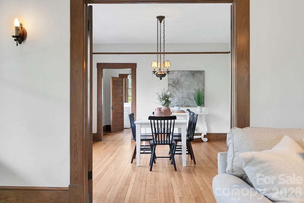 431 East Main Street Brevard, NC 28712 - Photo 15 of 45 a dining room with furniture and wooden floor