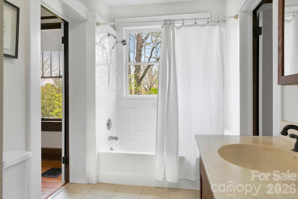 431 East Main Street Brevard, NC 28712 - Photo 23 of 45 a bathroom with a tub and shower