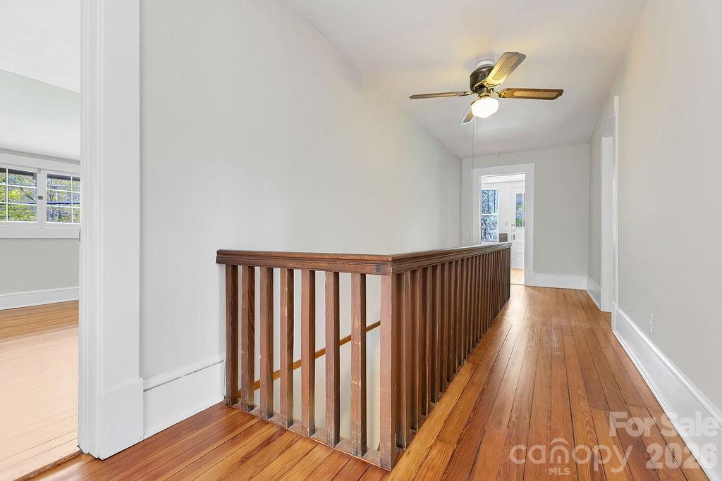 431 East Main Street Brevard, NC 28712 - Photo 34 of 45 a view of a hallway with wooden floor