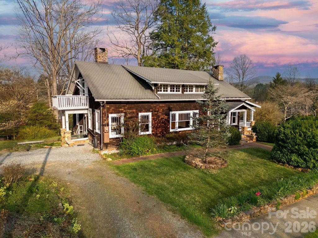 431 East Main Street Brevard, NC 28712 - Photo 41 of 45 front view of a house with a yard