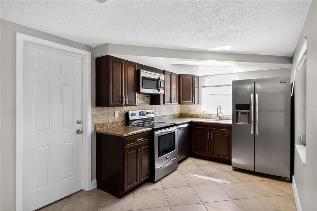 9105 Lunar Lane Port Richey, FL 34668 - Photo 9 of 16 Gallery Image 9