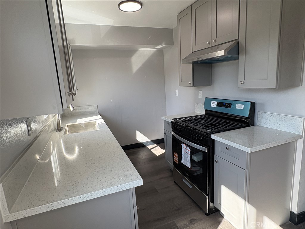 2826 Cogswell Road, Unit A #M El Monte, CA 91732 - Photo 22 of 55 a kitchen that has a sink and a stove