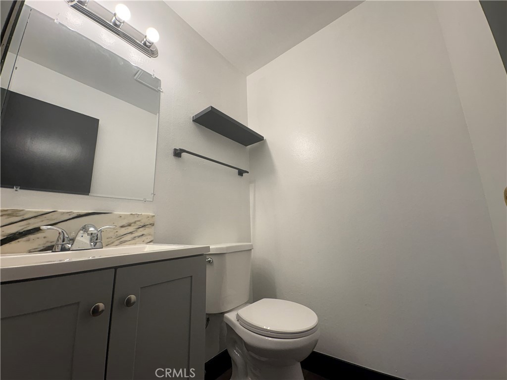 2826 Cogswell Road, Unit A #M El Monte, CA 91732 - Photo 29 of 55 a bathroom with a sink toilet and mirror