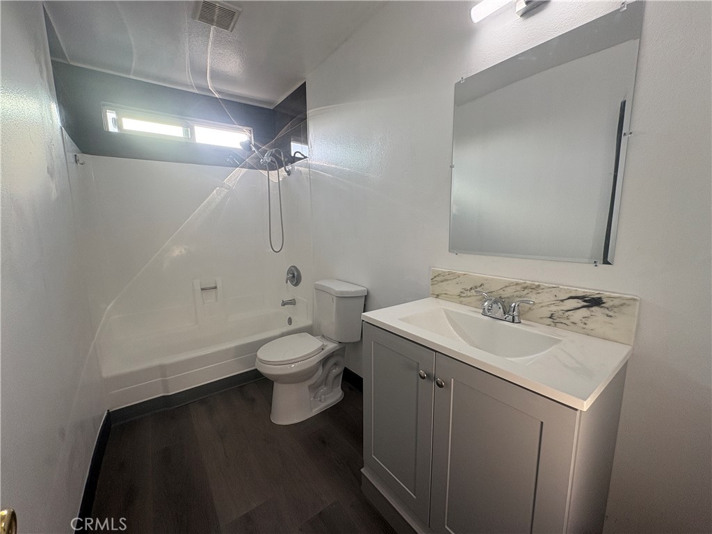 2826 Cogswell Road, Unit A #M El Monte, CA 91732 - Photo 30 of 55 a bathroom with a toilet sink and mirror