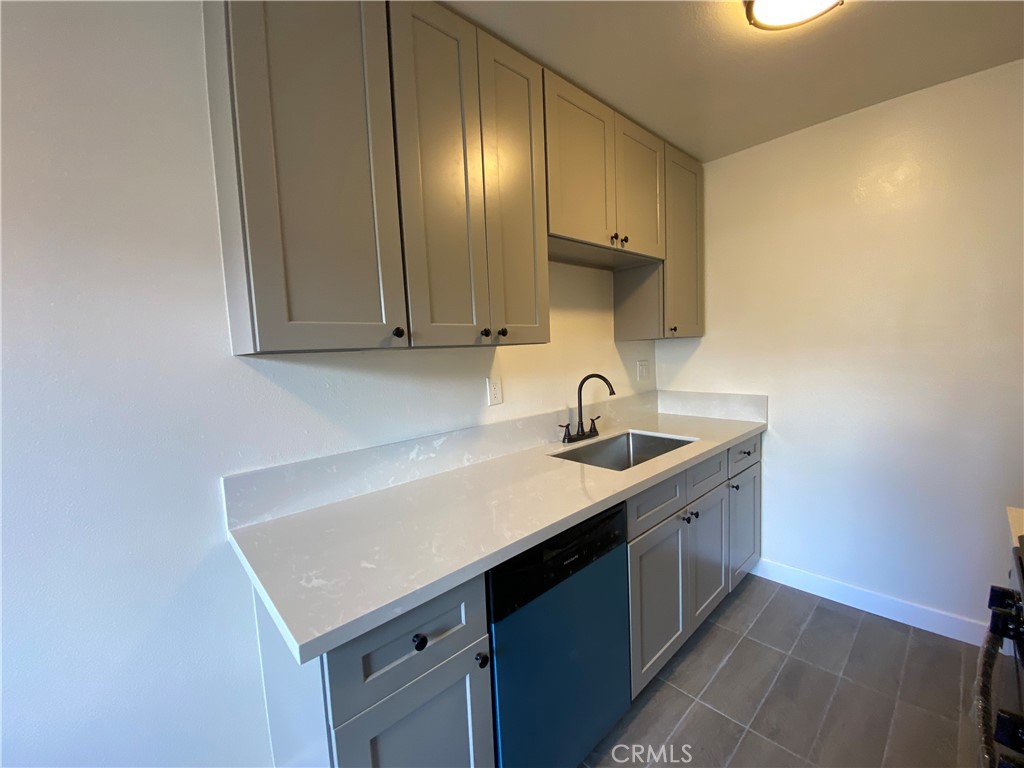 2826 Cogswell Road, Unit A #M El Monte, CA 91732 - Photo 36 of 55 a kitchen with a sink cabinets and utility