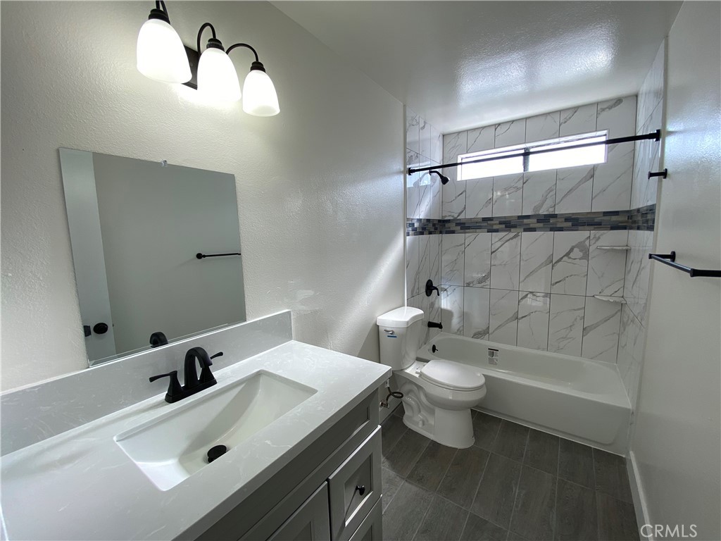 2826 Cogswell Road, Unit A #M El Monte, CA 91732 - Photo 44 of 55 a bathroom with a sink a toilet and shower
