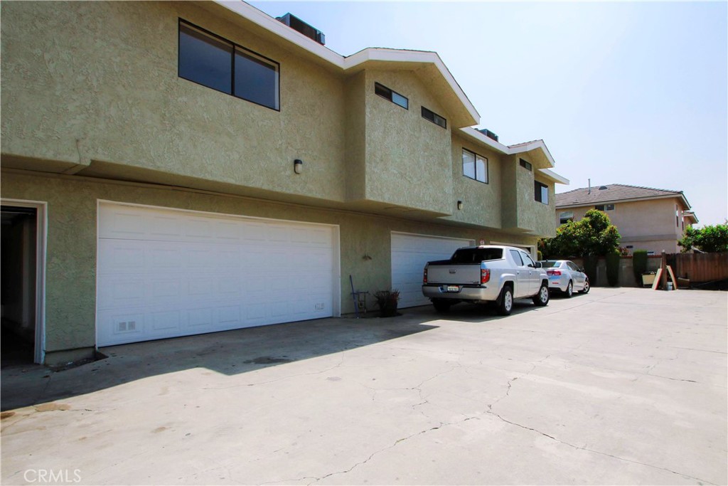 2826 Cogswell Road, Unit A #M El Monte, CA 91732 - Photo 5 of 55 a car parked in front of a building