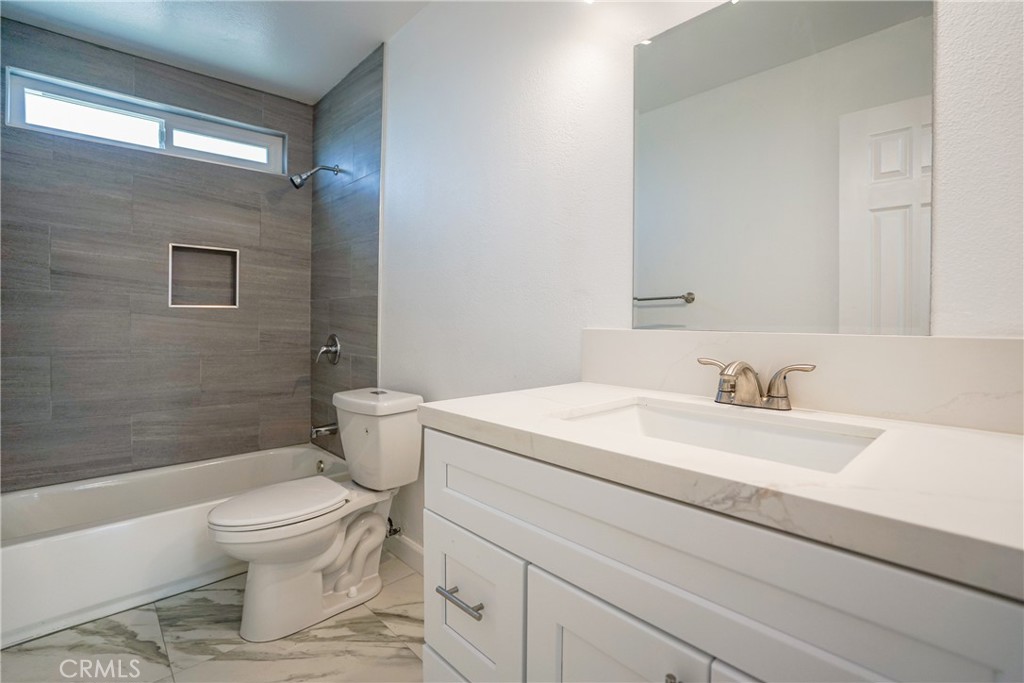 2826 Cogswell Road, Unit A #M El Monte, CA 91732 - Photo 52 of 55 a bathroom with a sink a toilet and shower