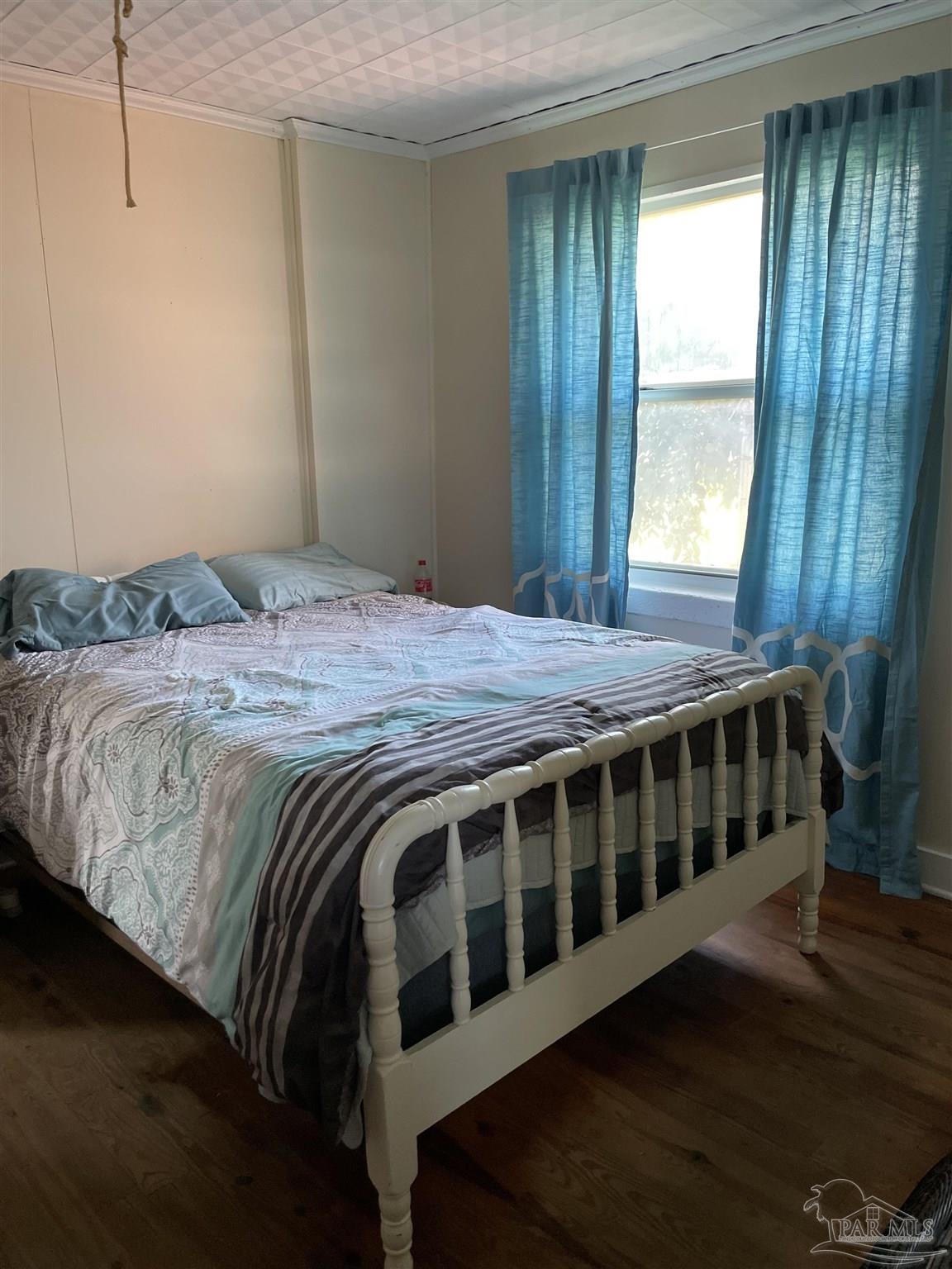 3971 Highway 4 Jay, FL 32565 - Photo 15 of 19 a bedroom with a bed and a window