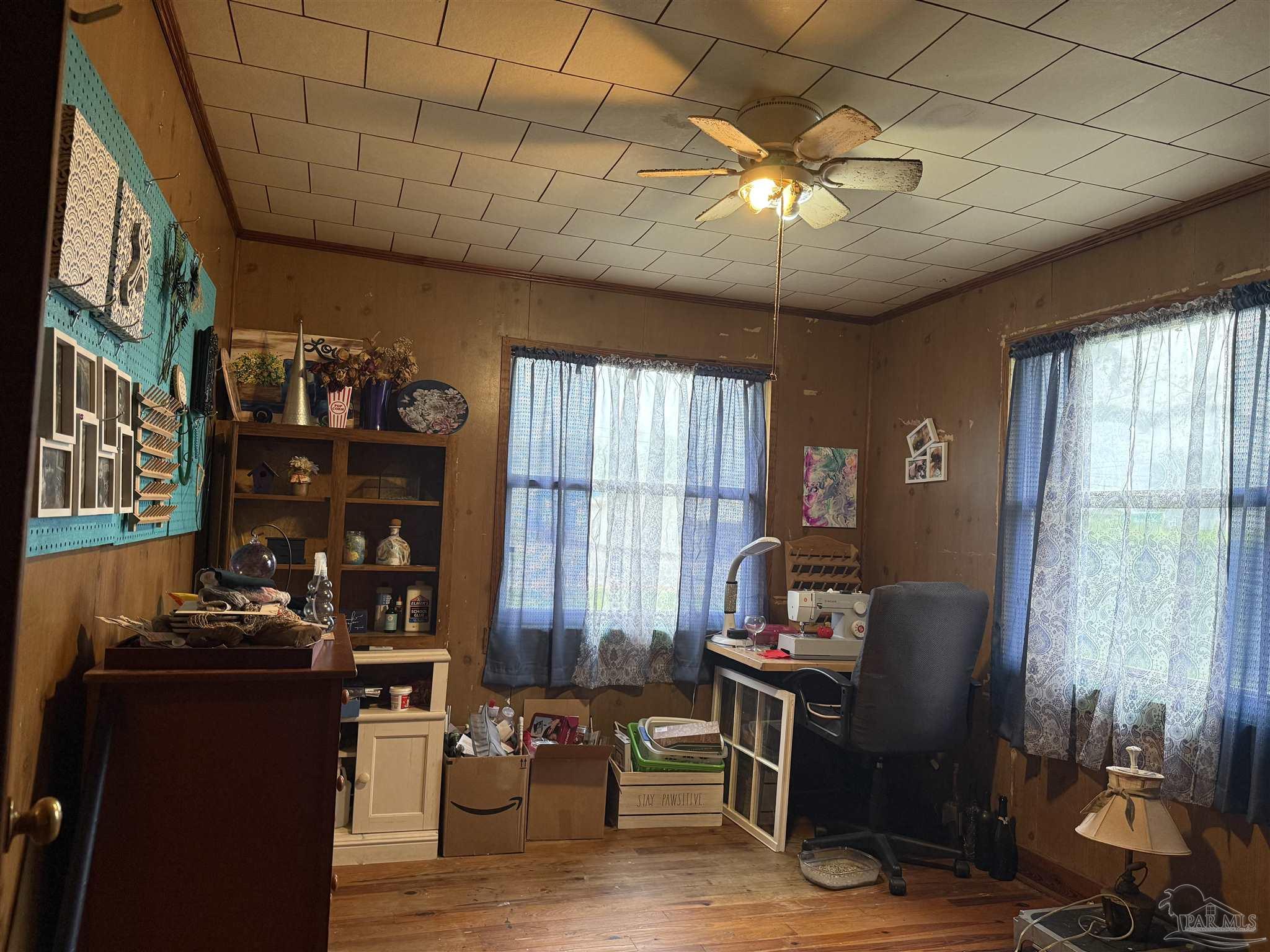 3971 Highway 4 Jay, FL 32565 - Photo 19 of 19 a living room with furniture a chandelier and a large window