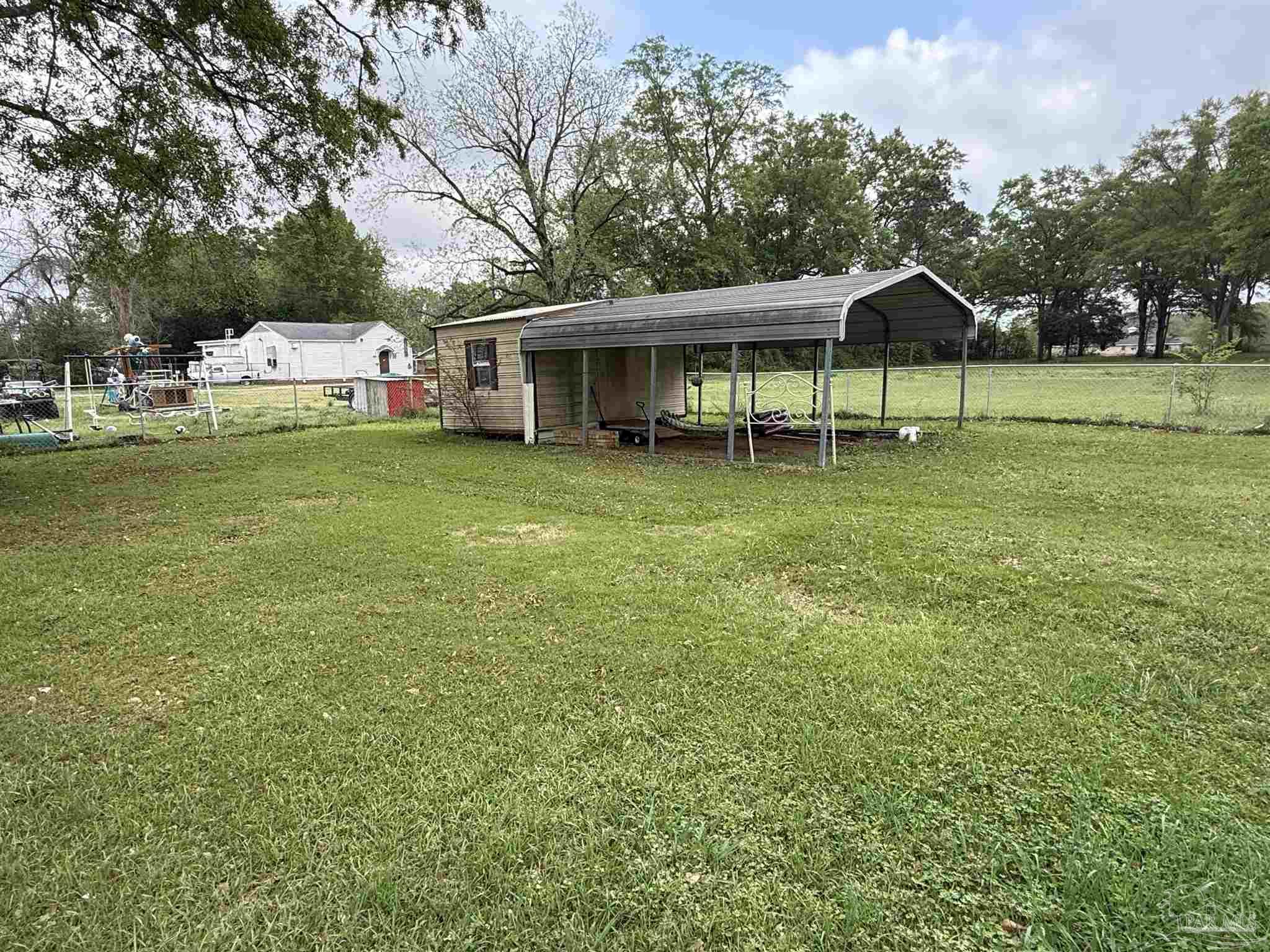 3971 Highway 4 Jay, FL 32565 - Photo 5 of 19 a view of a house with a yard