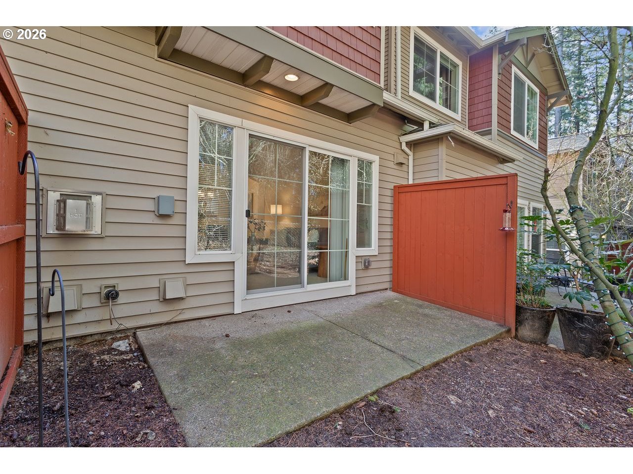 15450 Southwest Sparrow Loop, Unit 102 Beaverton, OR 97007 - Photo 26 of 27 a view of outdoor space and front view of a house