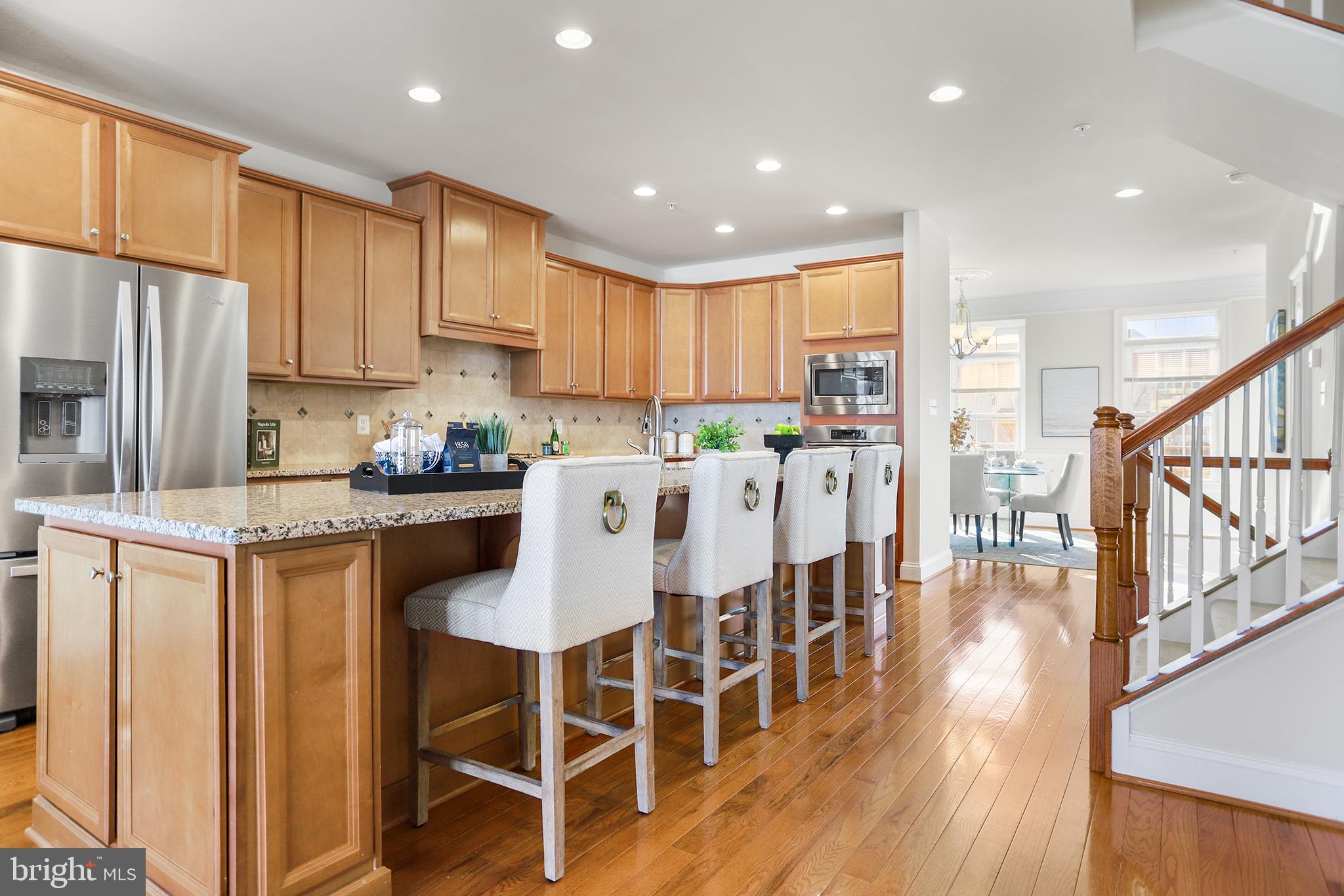 603 Stonecliffe Road Malvern, PA 19355 - Photo 12 of 30 Modern kitchen with warm wood accents.