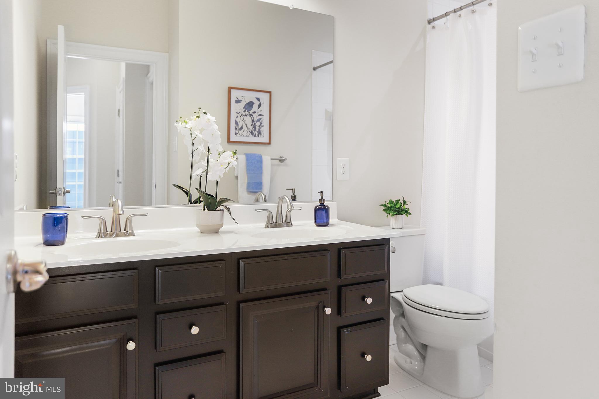 603 Stonecliffe Road Malvern, PA 19355 - Photo 24 of 30 Elegant bathroom with modern finishes.
