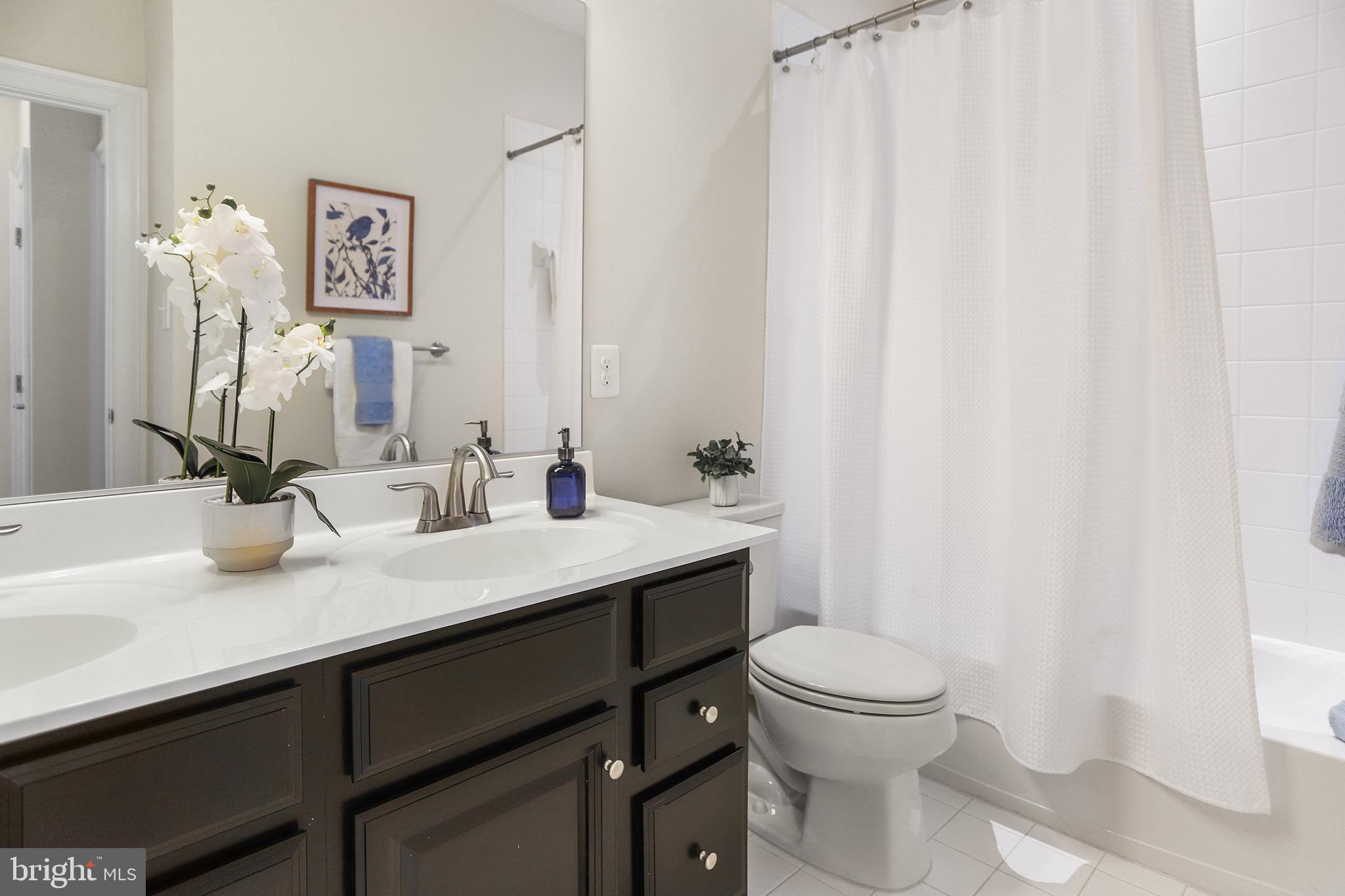 603 Stonecliffe Road Malvern, PA 19355 - Photo 25 of 30 Elegant bathroom with modern finishes.
