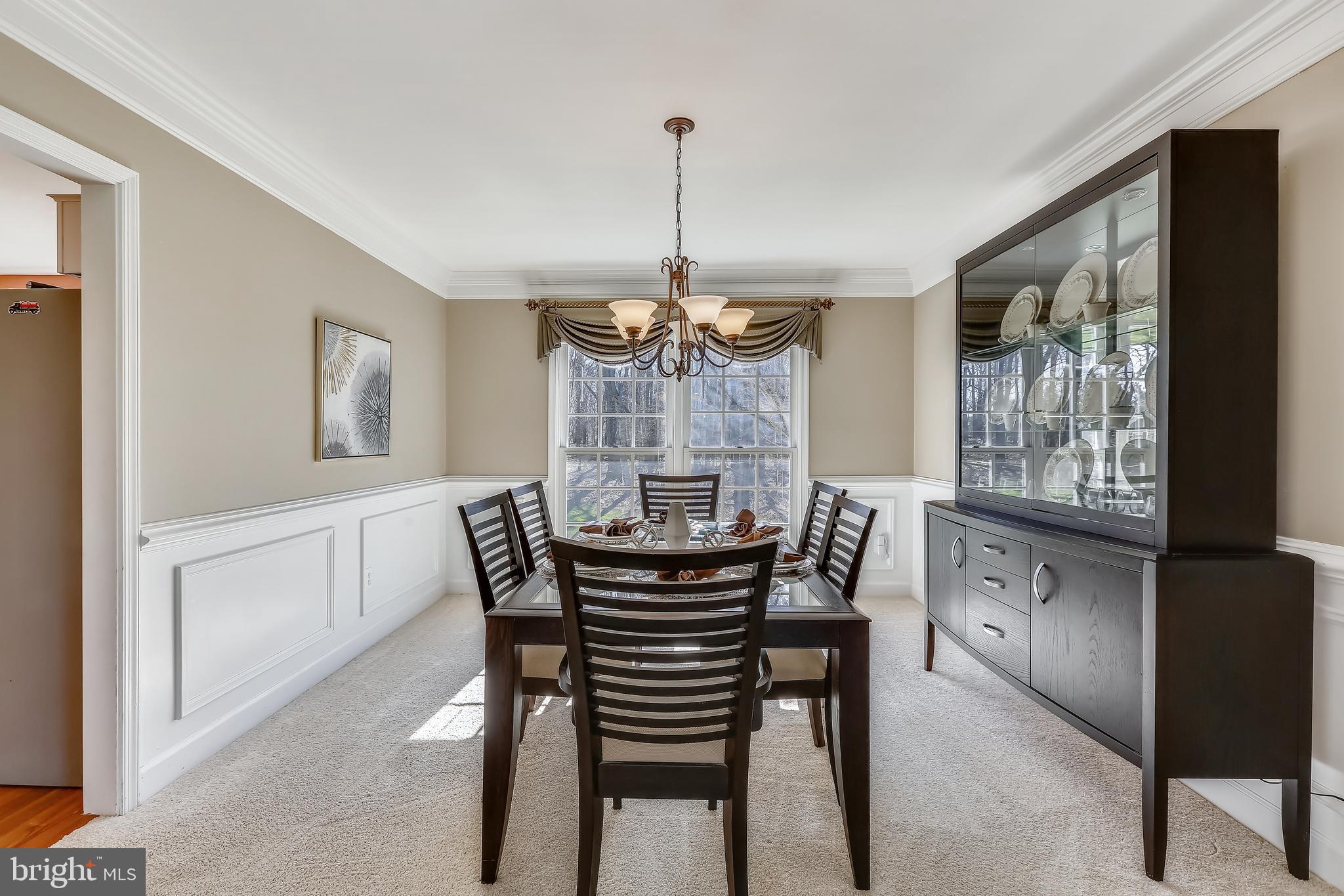 22406 Sweetleaf Lane Gaithersburg, MD 20882 - Photo 24 of 60 Dining Room with Chandelier