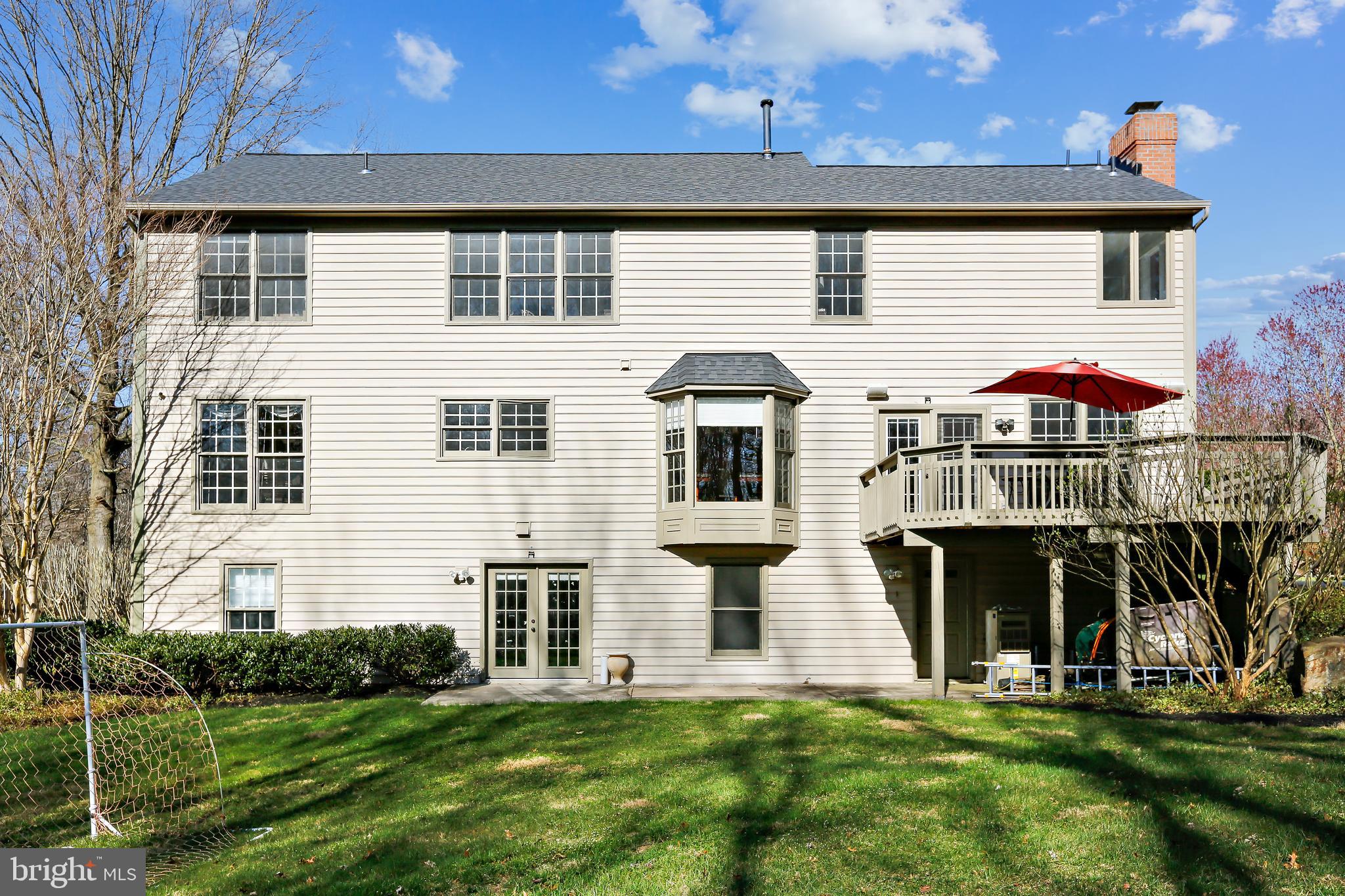 22406 Sweetleaf Lane Gaithersburg, MD 20882 - Photo 55 of 60 Back of Home with Deck and Patio