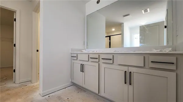 a view of a room with racks on the wall