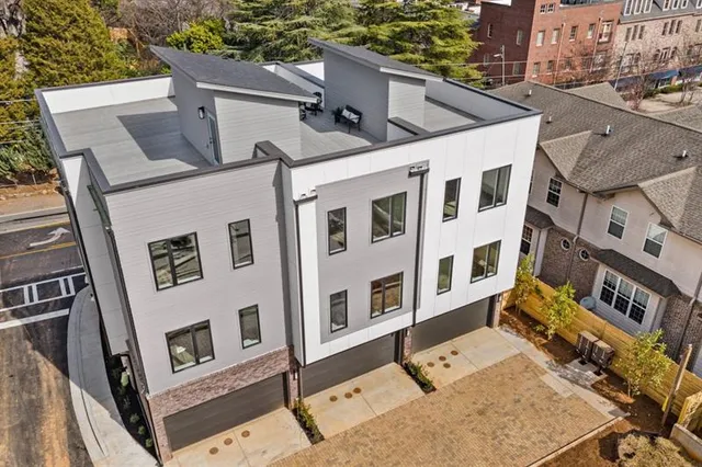 a building that has a street sign on it