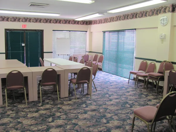 a view of a dining room with furniture