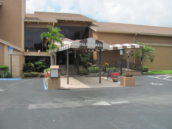 a view of a chairs and tables in patio