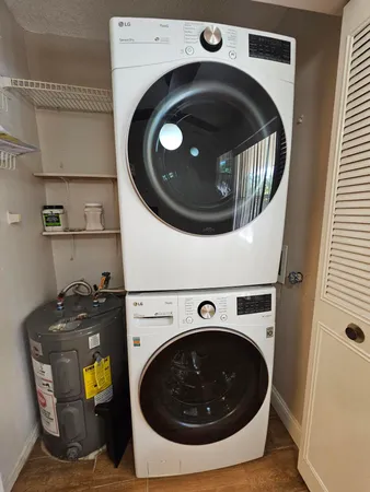 a utility room with dryer and washer