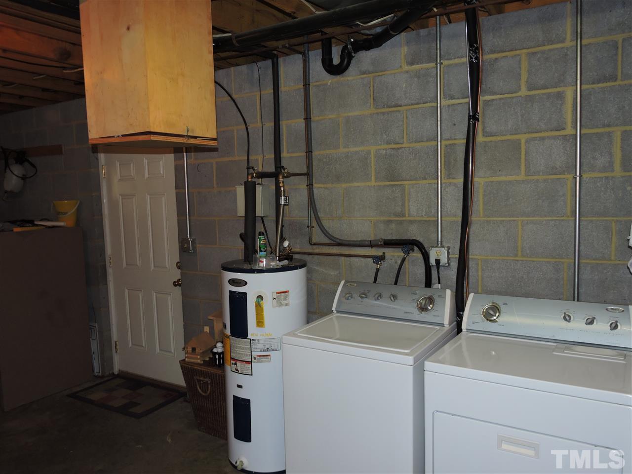 1104 Ridge Road Roxboro, NC 27573 - Photo 11 of 15 a bathroom with a sink and a shower