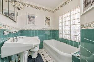 2000 South Polk Street Amarillo, TX 79109 - Photo 11 of 12 a bathroom with a sink and a bathtub