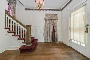 2000 South Polk Street Amarillo, TX 79109 - Photo 4 of 12 a living room with furniture and a stairs