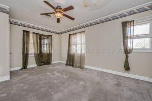 2000 South Polk Street Amarillo, TX 79109 - Photo 7 of 12 a view of an empty room with a window