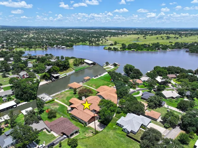 a view of a lake with a houses