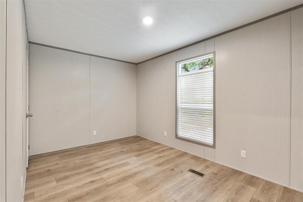 125 Neches Mabank, TX 75156 - Photo 20 of 23 a view of an empty room with a window