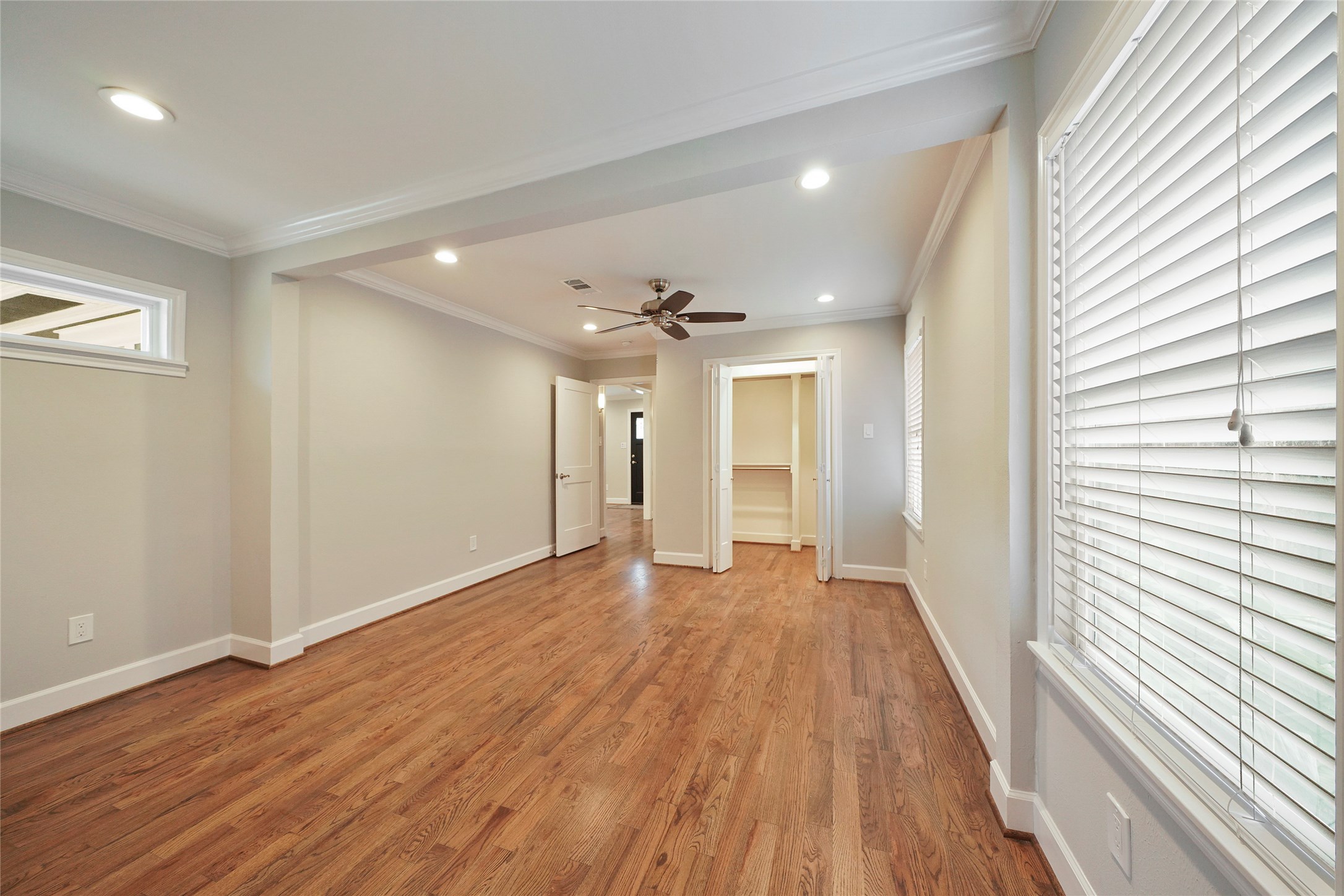 1229 Timbergrove Lane Houston, TX 77008 - Photo 17 of 30 a view of empty room with wooden floor and fan