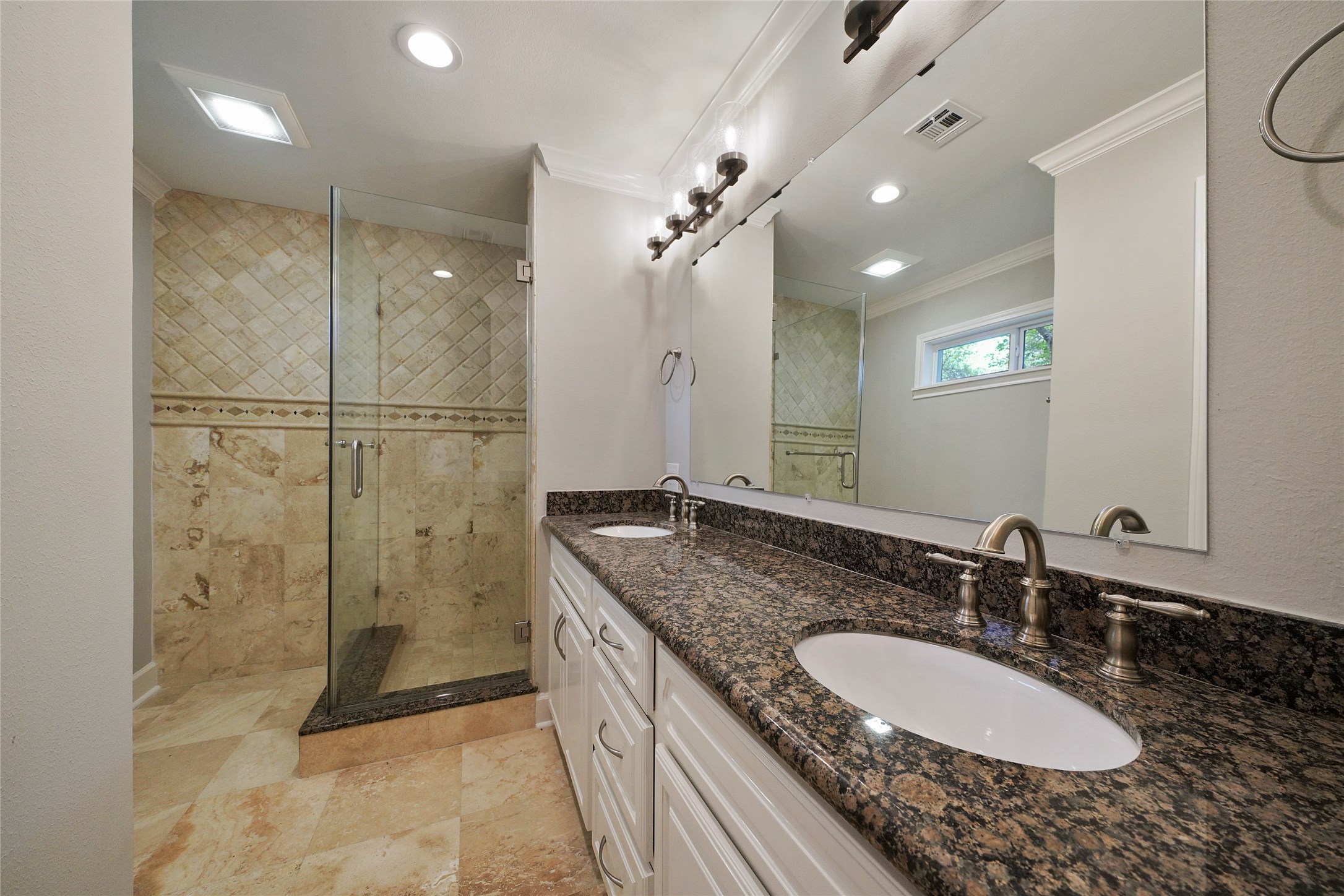 1229 Timbergrove Lane Houston, TX 77008 - Photo 18 of 30 a bathroom with a granite countertop sink a mirror and a shower