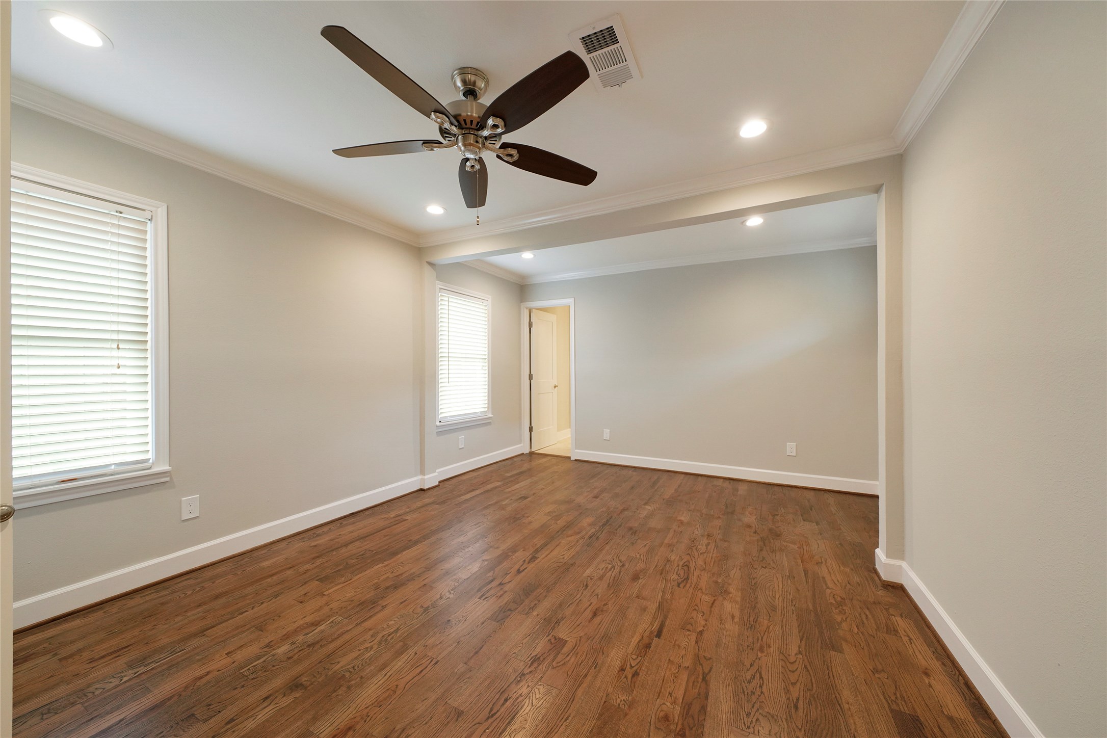 1229 Timbergrove Lane Houston, TX 77008 - Photo 23 of 30 wooden floor in an empty room with a window