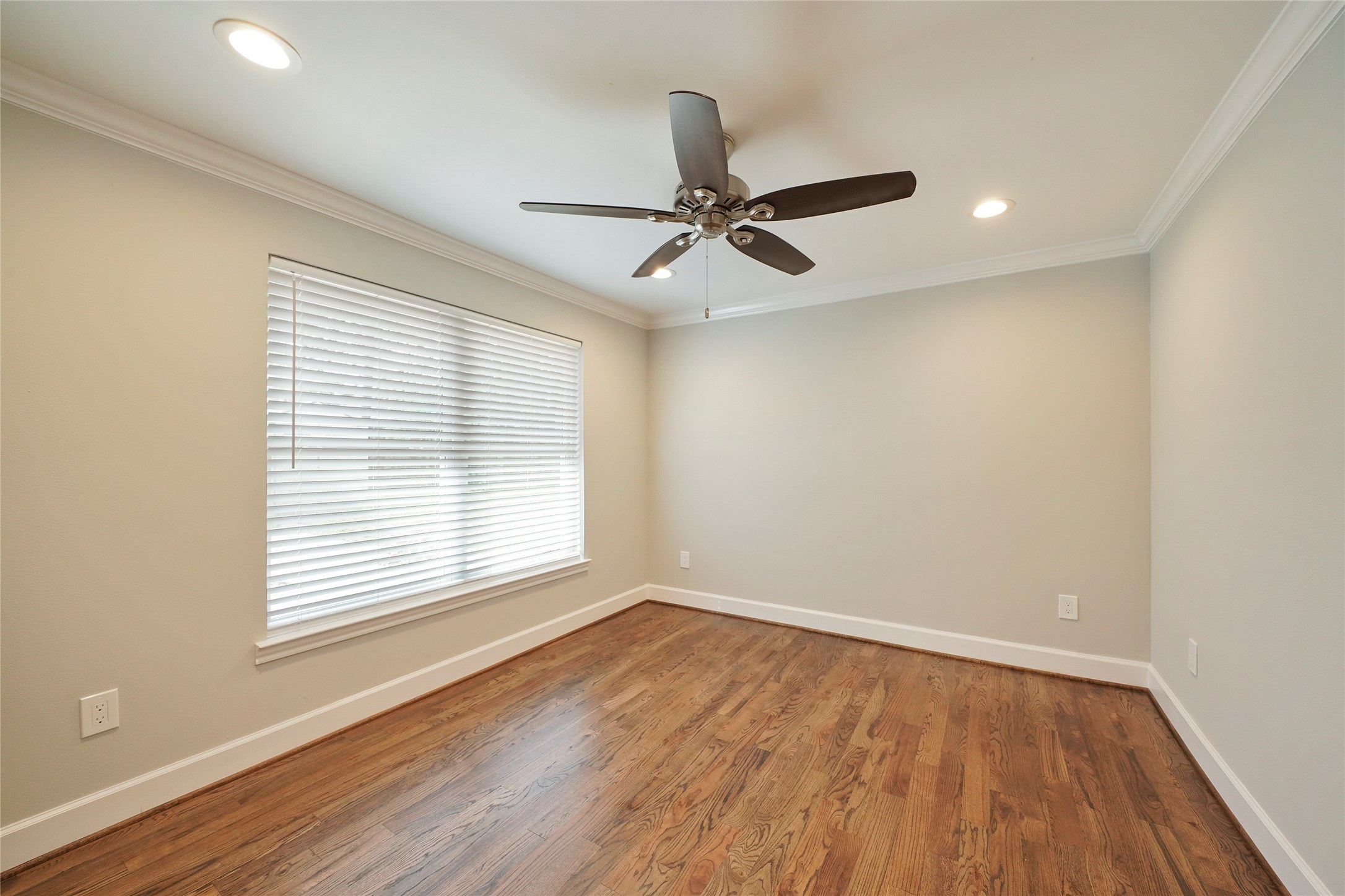 1229 Timbergrove Lane Houston, TX 77008 - Photo 24 of 30 wooden floor in an empty room with a window