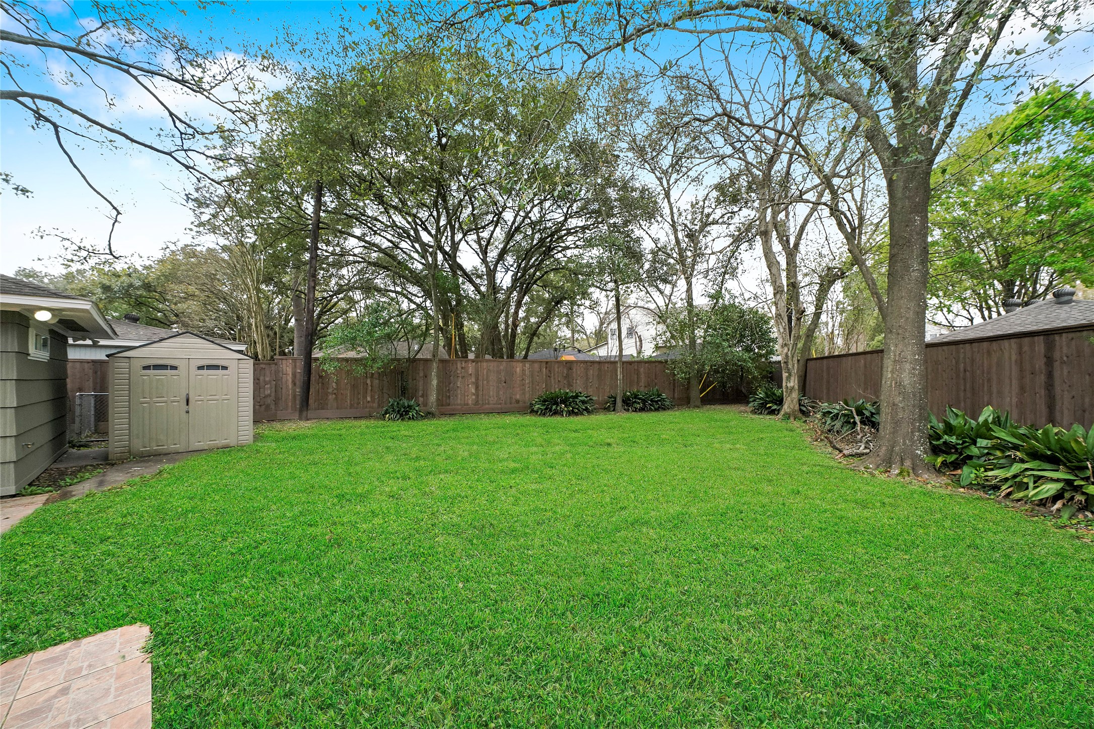 1229 Timbergrove Lane Houston, TX 77008 - Photo 28 of 30 a view of a backyard with a small cabin