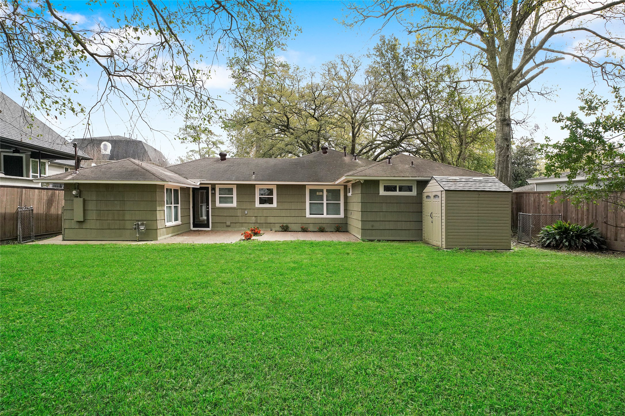 1229 Timbergrove Lane Houston, TX 77008 - Photo 30 of 30 a front view of a house with a garden