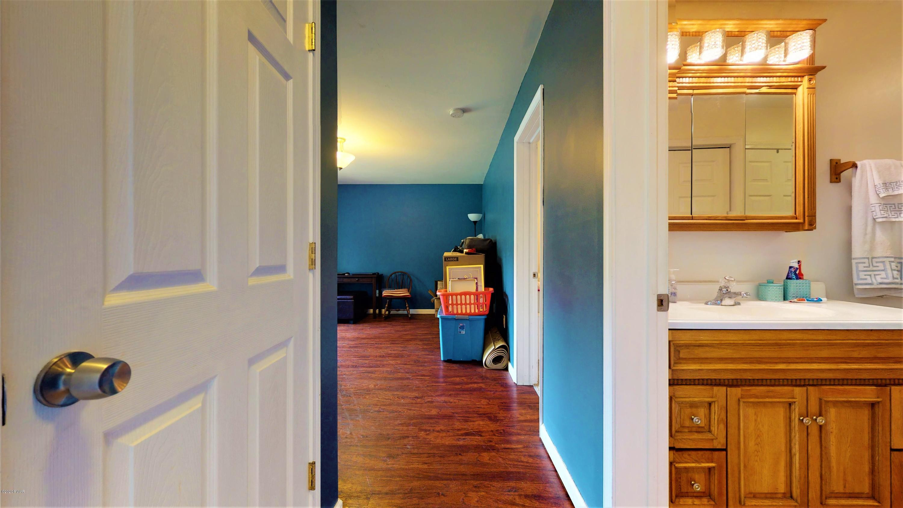 143 Raccoon Road Dingmans Ferry, PA 18328 - Photo 73 of 87 a view of a kitchen from the hallway