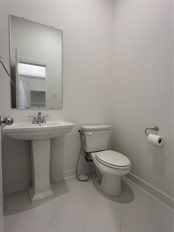 3708 Queen Road Sherman, TX 75090 - Photo 9 of 30 Bathroom with tile flooring and toilet