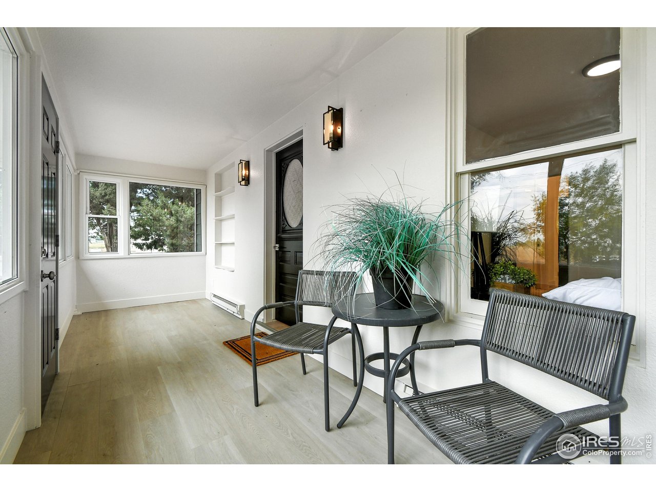24149 County Road 70 Eaton, CO 80615 - Photo 7 of 40 a living room with furniture and a window
