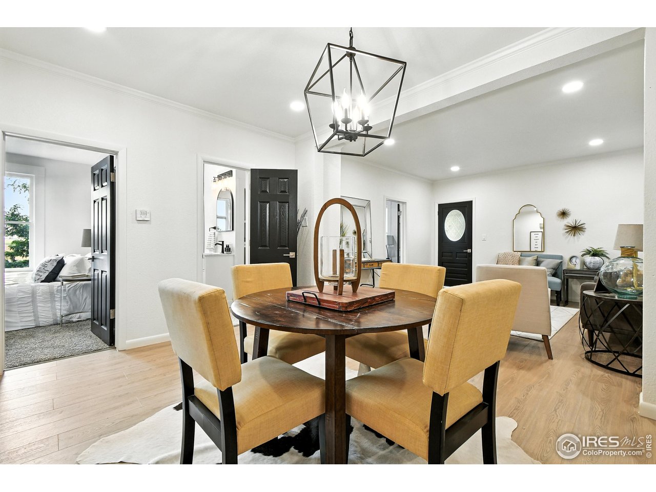 24149 County Road 70 Eaton, CO 80615 - Photo 9 of 40 a view of a dining room and a livingroom