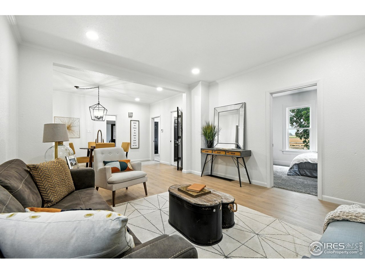 24149 County Road 70 Eaton, CO 80615 - Photo 10 of 40 a living room with furniture and a couch