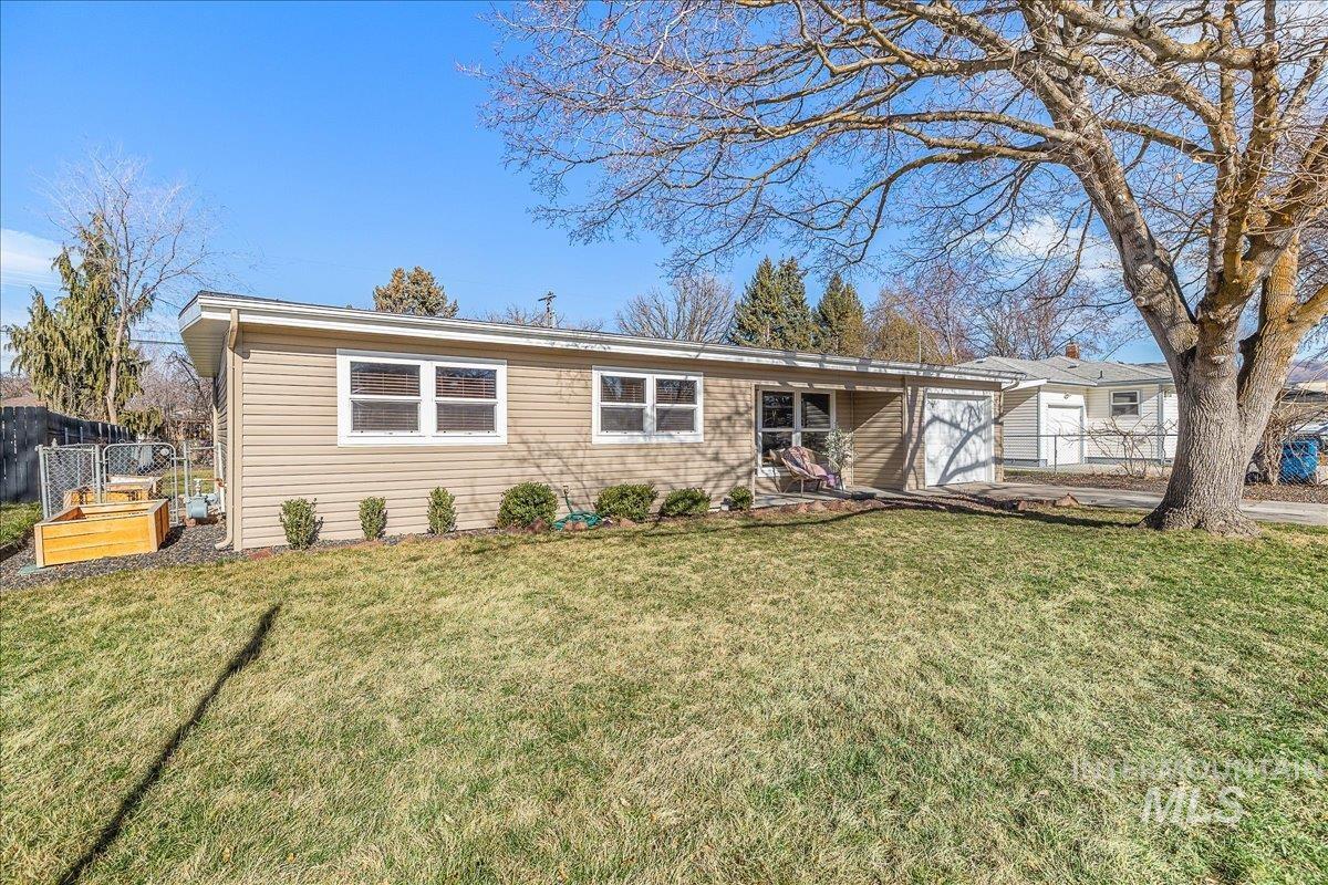 1910 Lemhi Street Boise, ID 83705 - Photo 2 of 41 Ranch-style home featuring an attached garage