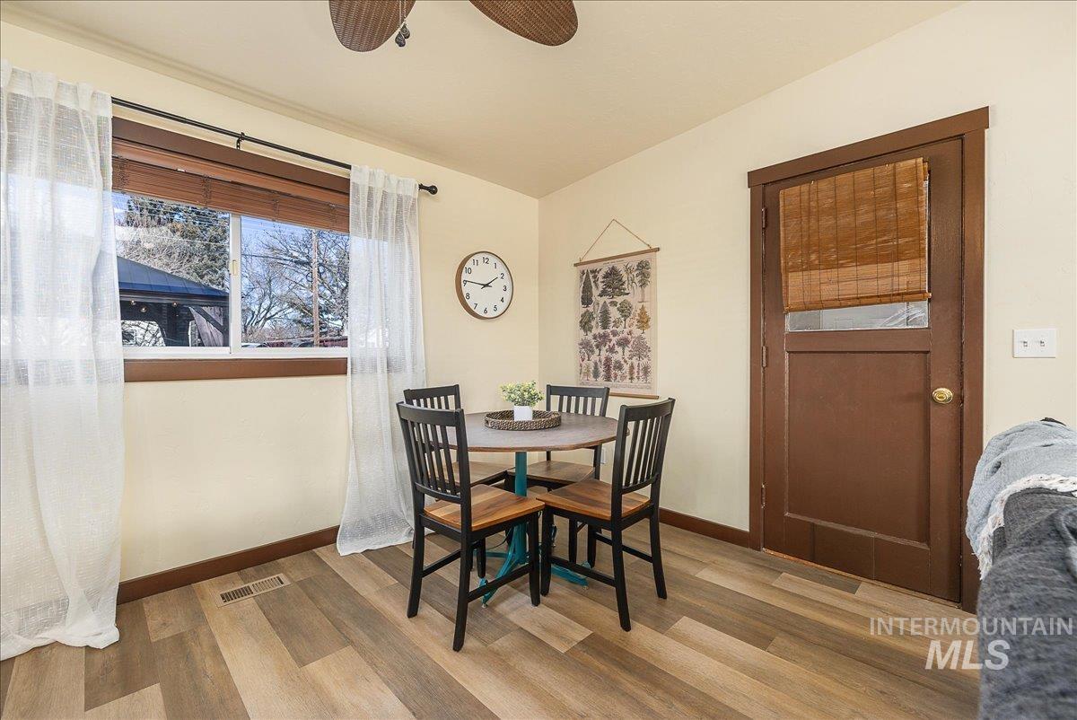 1910 Lemhi Street Boise, ID 83705 - Photo 24 of 41 Dining space featuring light wood finished floors, a ceiling fan, and lofted ceiling