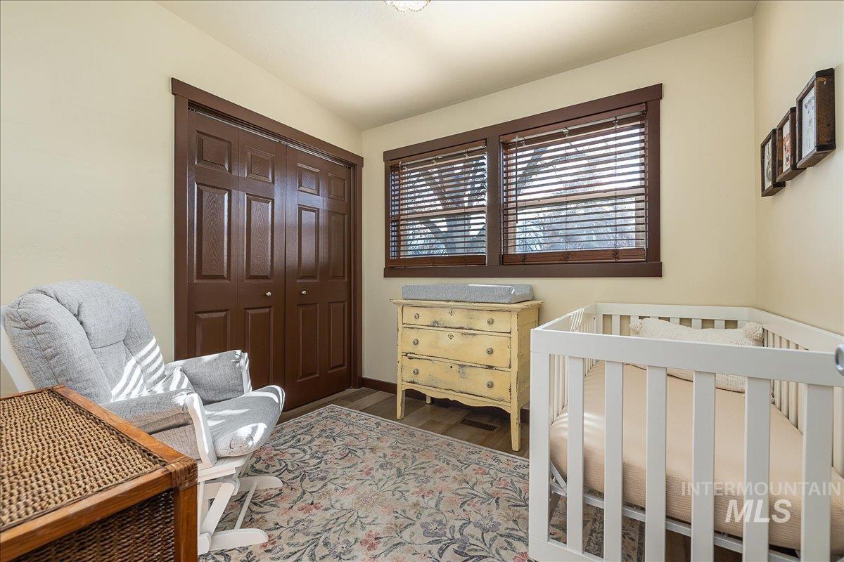 1910 Lemhi Street Boise, ID 83705 - Photo 33 of 41 Bedroom with a closet and wood finished floors