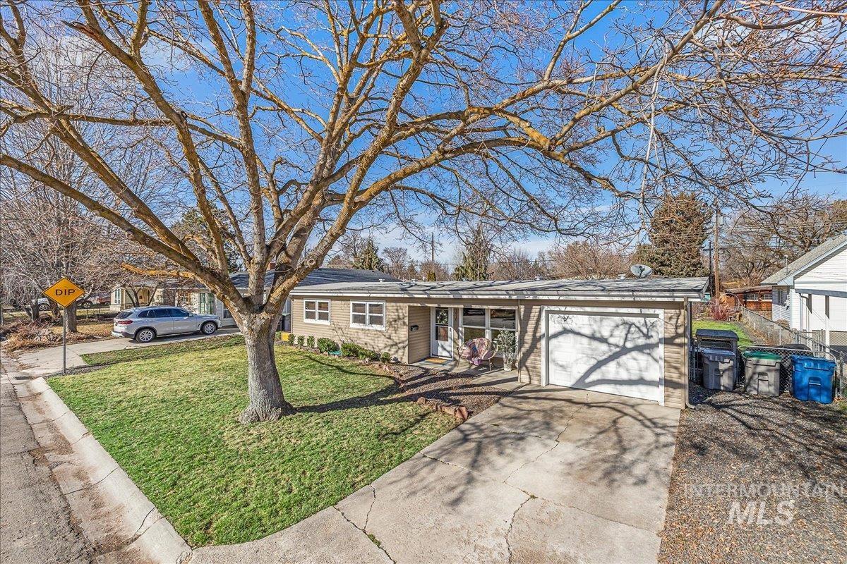 1910 Lemhi Street Boise, ID 83705 - Photo 41 of 41 Ranch-style house with a garage, driveway, and a front yard