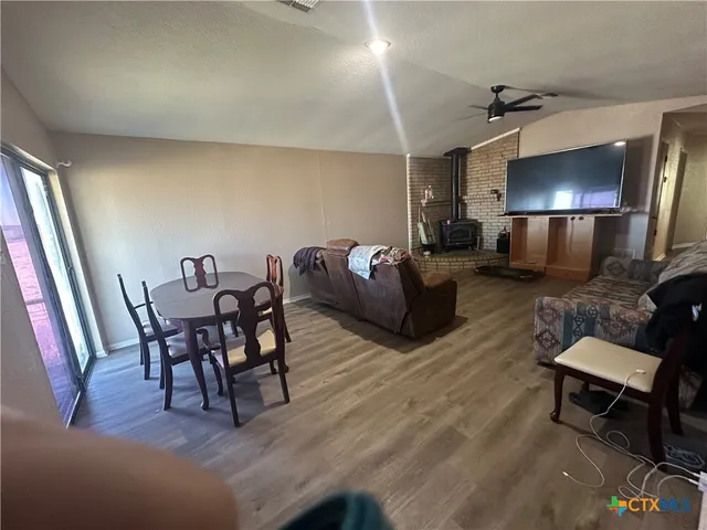 a kitchen with a stove and a microwave