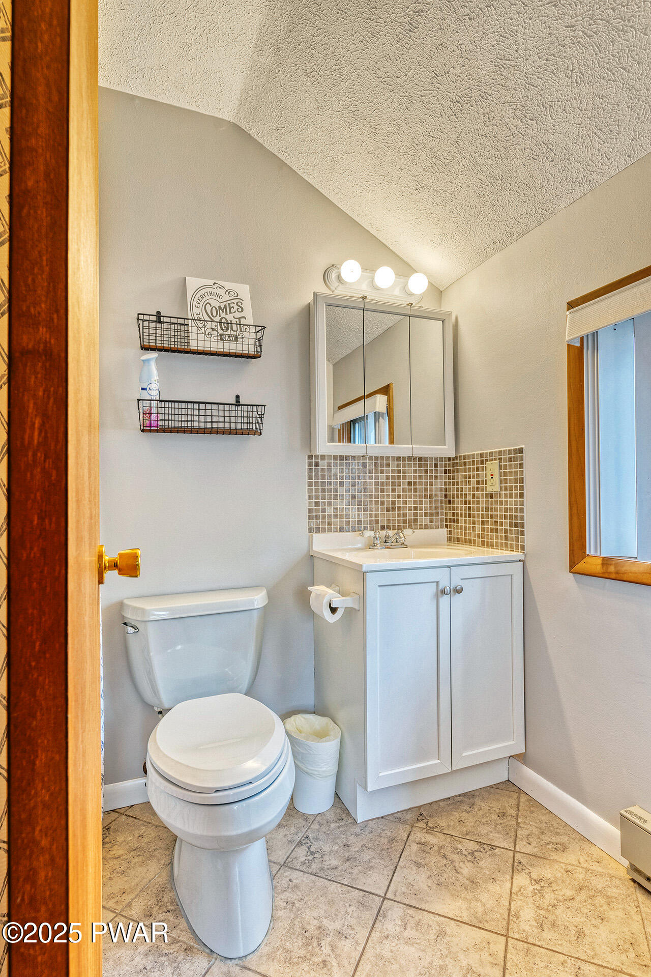 242 Northgate Road Lake Ariel, PA 18436 - Photo 36 of 85 a bathroom with a granite countertop toilet and a sink
