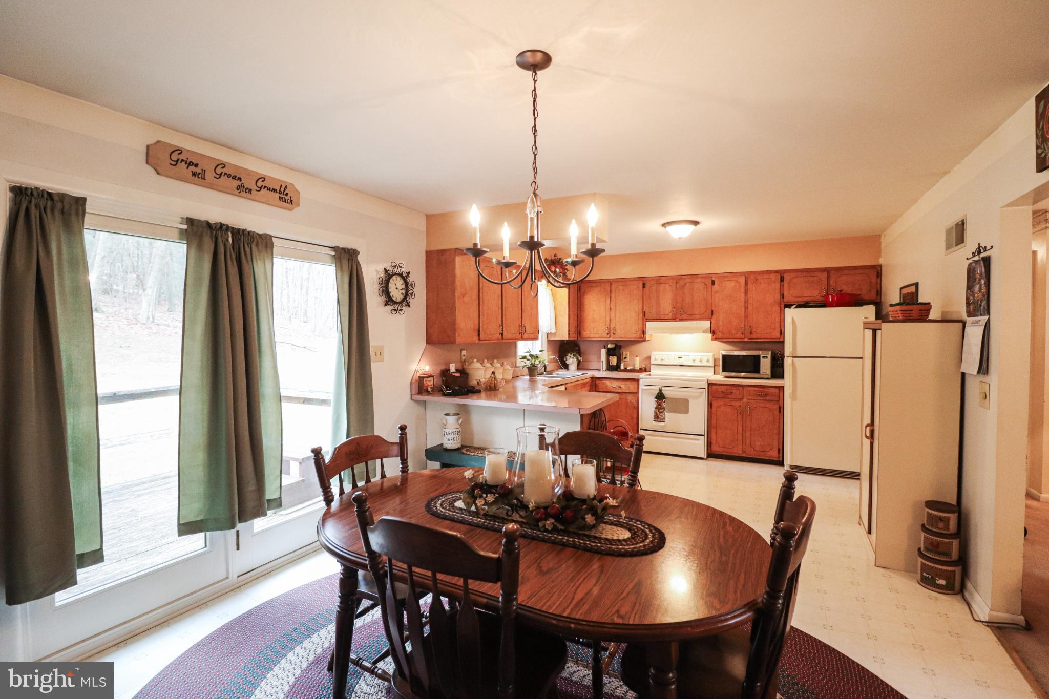 92 Newman Road Orrtanna, PA 17353 - Photo 13 of 42 Charming kitchen with natural light and warmth.